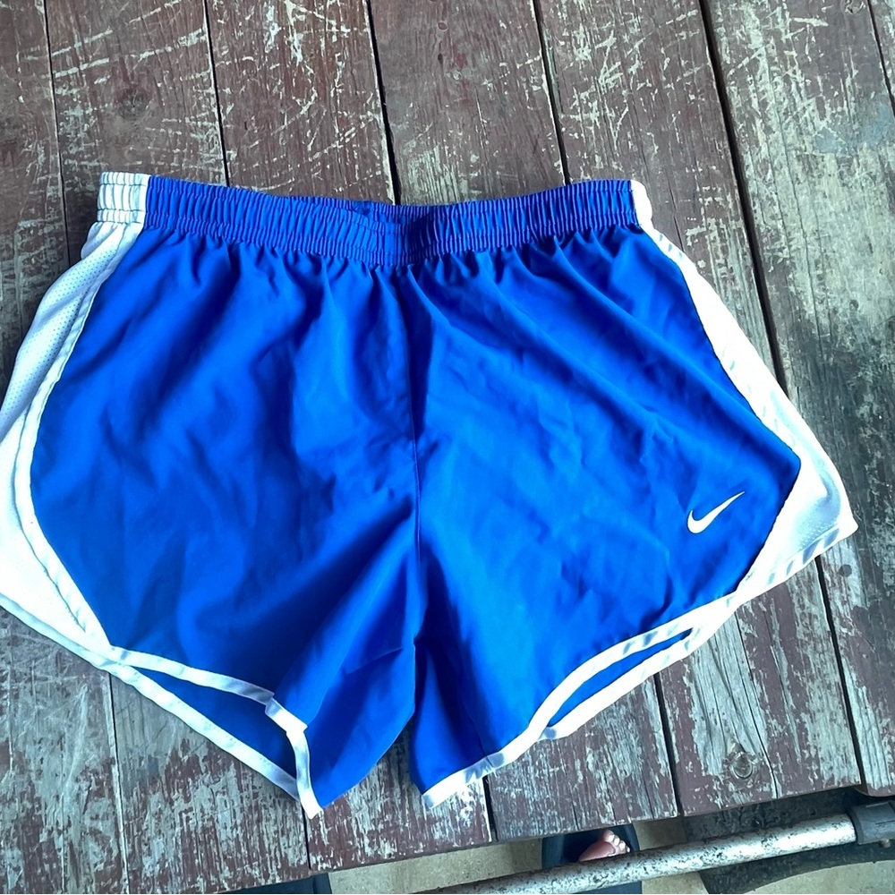 Nike Girls Size Medium Blue and White Athletic Shorts with Curved Hem